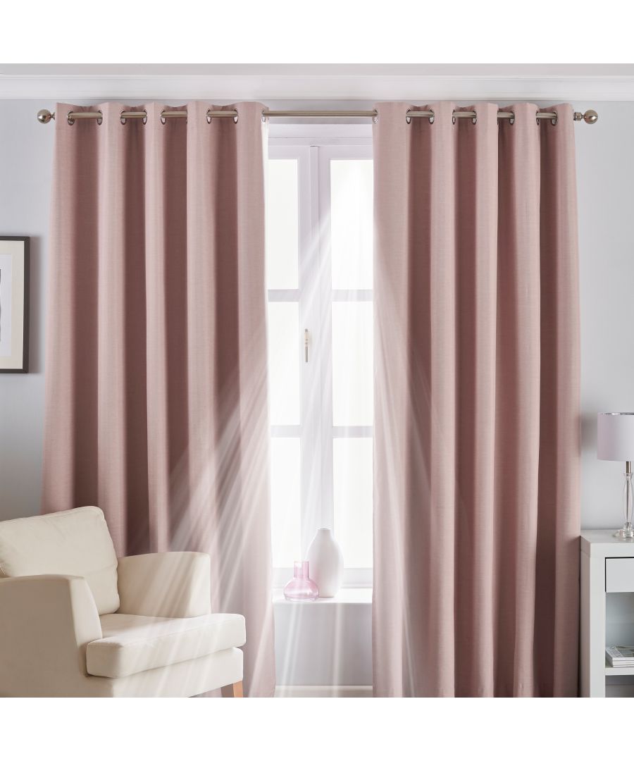 Blush-colored blackout roller blind measuring 61 cm x 162 cm, featuring a smooth fabric texture, designed to block light and enhance privacy.