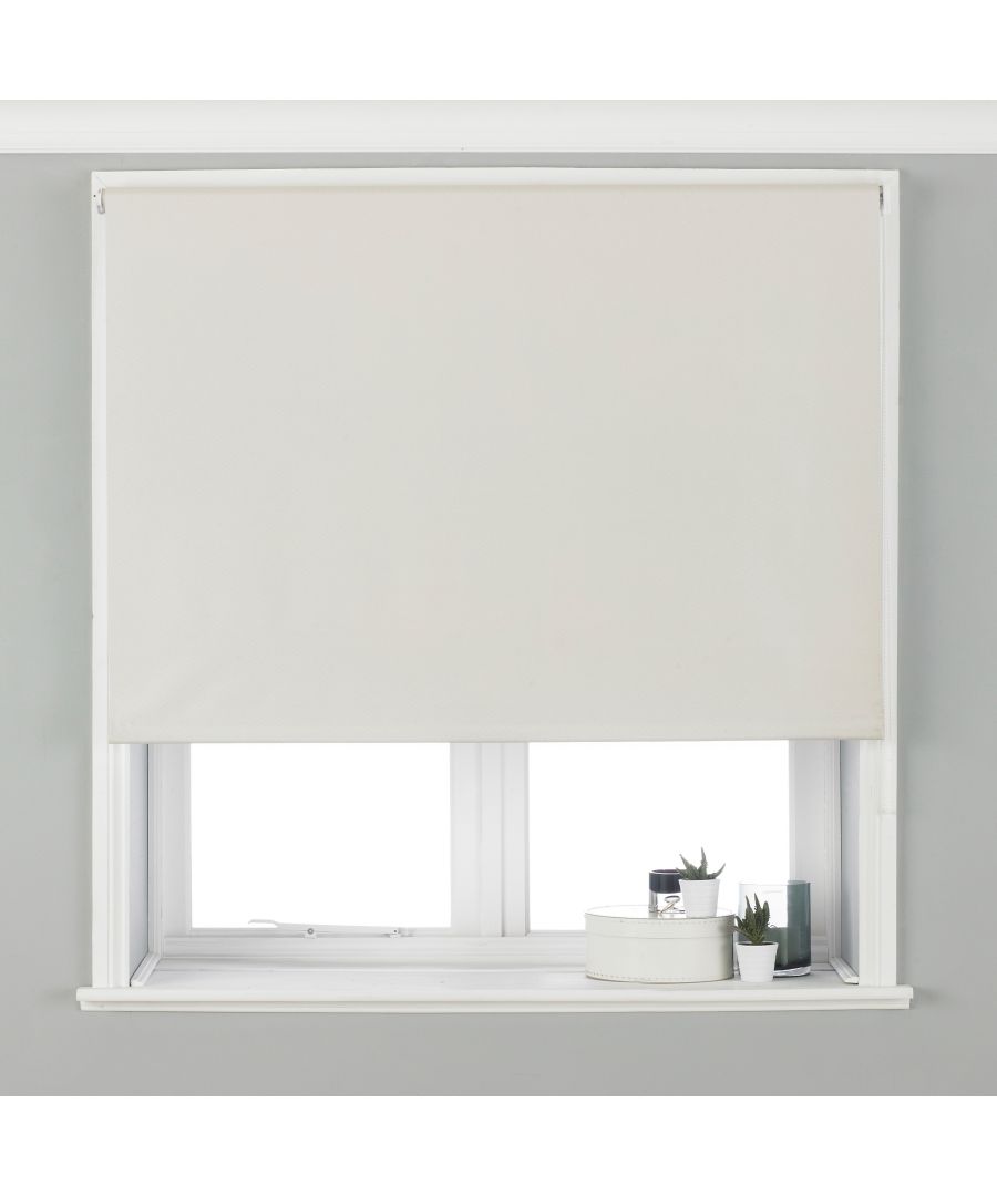 Ivory blackout blinds by Riva Home, measuring 122 cm x 162 cm, featuring a smooth fabric texture and a simple, modern design, installed on a white window frame.
