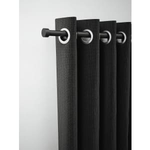 Rothley extendable curtain pole in matte black steel, featuring a stud finial, adjustable length from 165-300cm, with textured black curtains and silver eyelets.