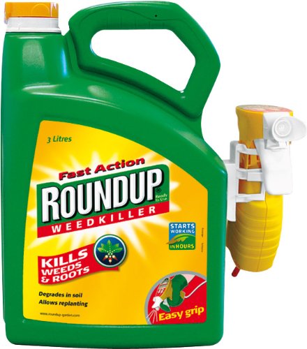Green plastic container of Roundup Fast Action TOTAL Weedkiller, 3 litres, featuring a yellow spray nozzle and easy grip handle, with labels highlighting its effectiveness against weeds and roots.