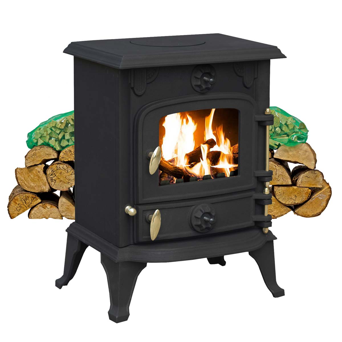 Black cast iron multifuel stove with a glass front displaying flames, featuring decorative knobs and a firewood starter kit of logs and kindling stacked beside it.