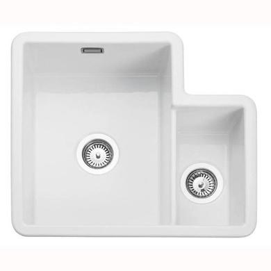 White fire clay ceramic undermount sink featuring a spacious main bowl and a smaller side bowl, both with round stainless steel strainers.