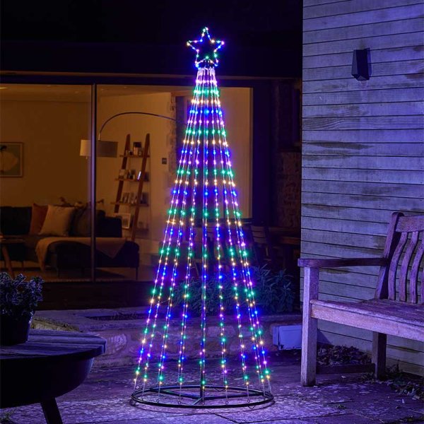 A 1.5m tall light-up Christmas tree featuring a star topper, made of metal, adorned with multi-coloured LEDs in blue, green, and red, set against a dark background.