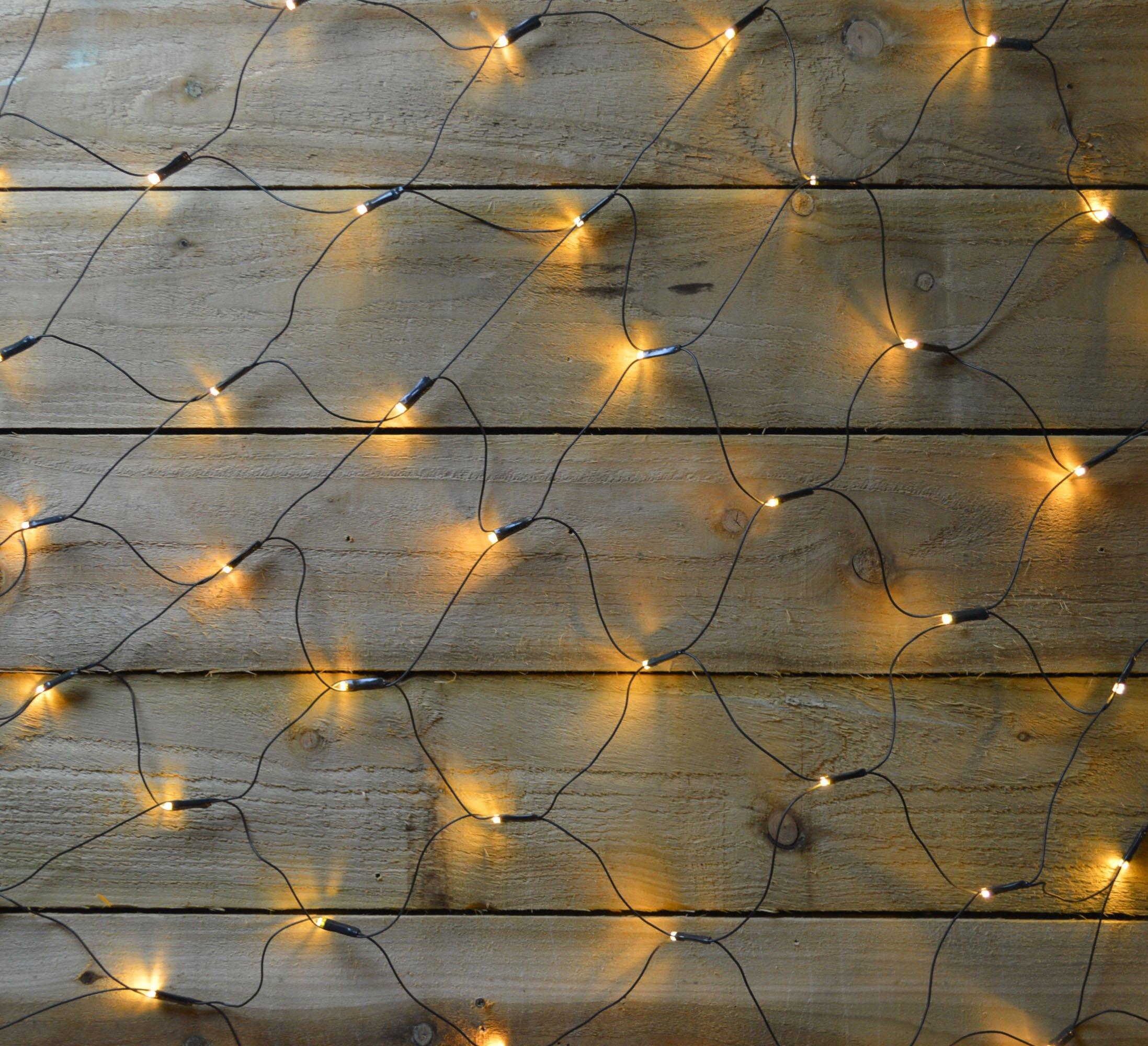 Warm white LED Christmas net lights with a black wire, measuring 3.5M x 1.2M, designed for decorative window display, featuring multi-action lighting effects.
