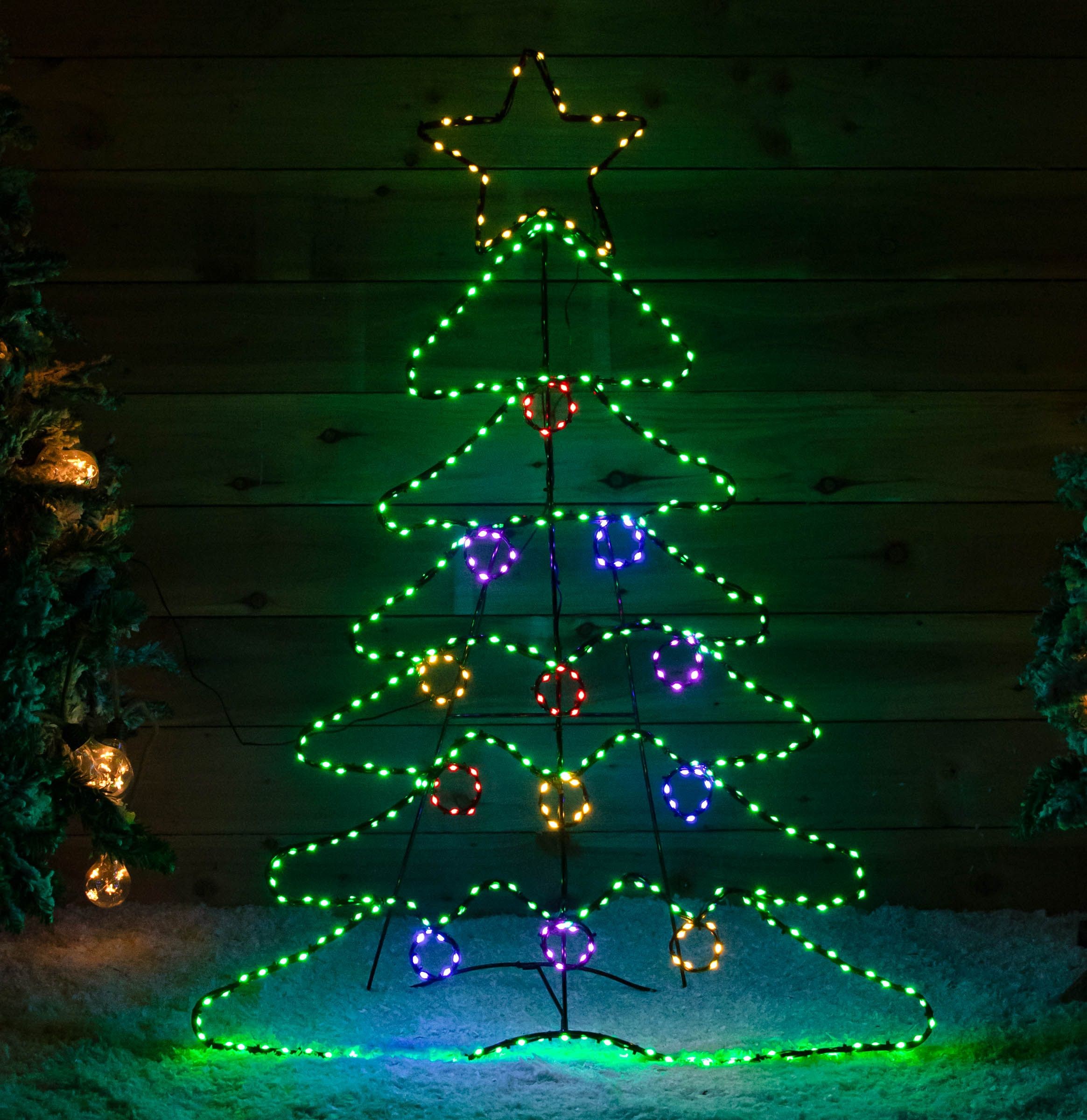 Light-up standing Christmas tree featuring a star topper, outlined in green lights with 385 multi-coloured LEDs, adorned with vibrant ornaments in red, blue, and yellow.