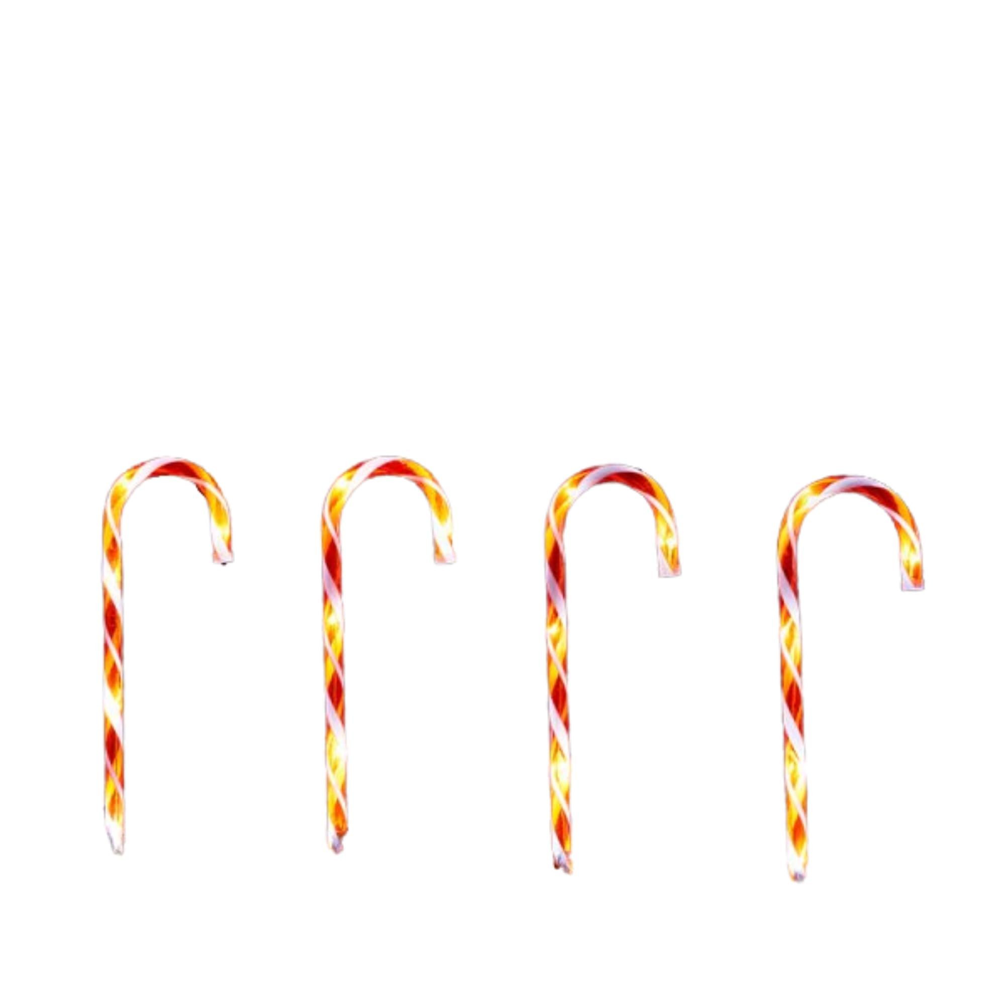 Set of 8 large Christmas candy cane garden path lights, each 50cm tall, featuring red and white stripes with 80 warm white LEDs for festive outdoor decoration.