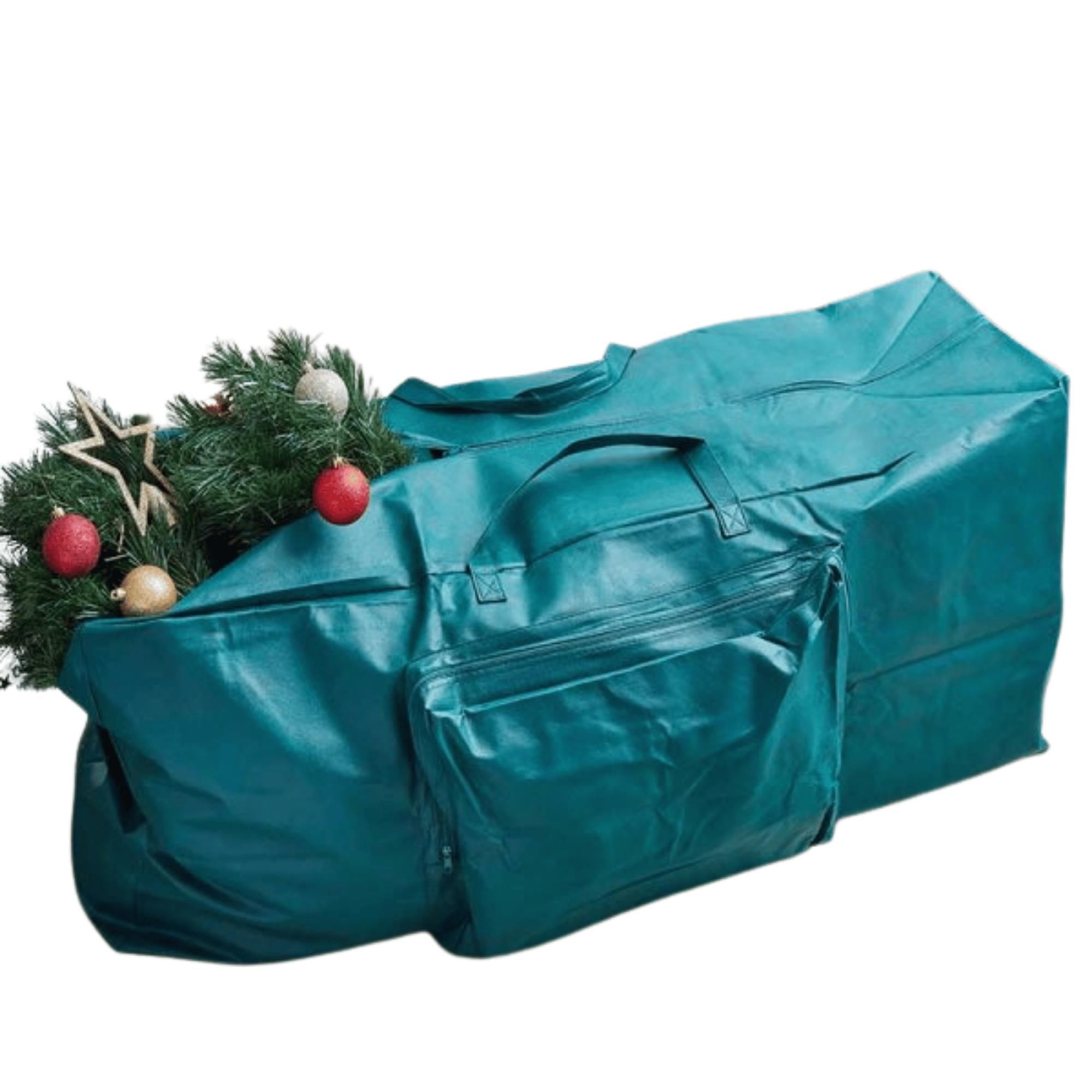 Large green storage bag made of durable material, designed for Christmas tree and decorations, featuring two handles and a front zip pocket.