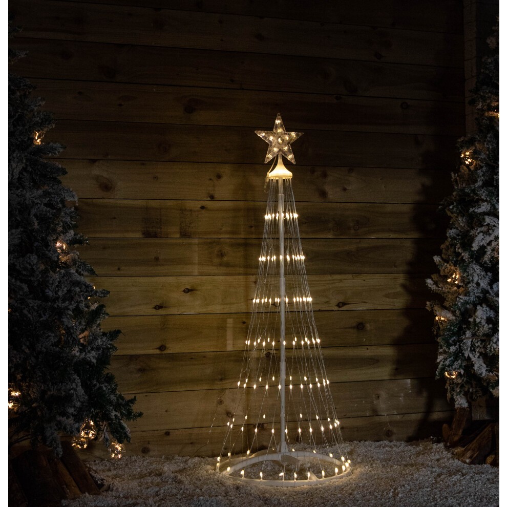 1.35m tall white cone-shaped Christmas tree adorned with 160 warm white LEDs, featuring a star topper and a timer function, set against a rustic wooden backdrop.