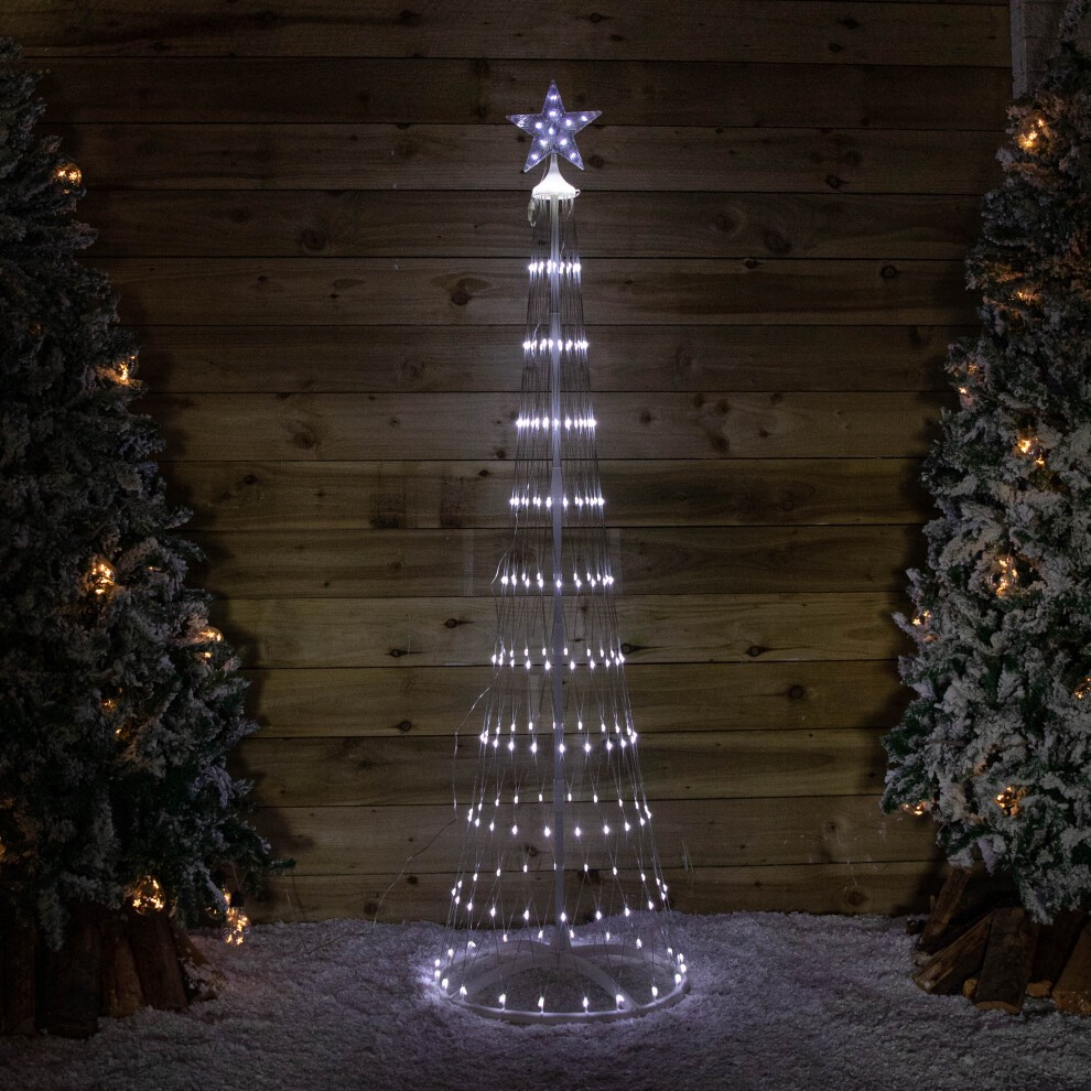 White light-up Christmas cone tree, 1.8 meters tall, adorned with 220 white LEDs, featuring a star on top and a timer function, set against a wooden backdrop with snowy greenery.