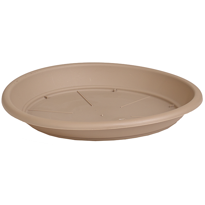 Beige plastic saucer with a circular shape, measuring 26 cm in diameter, featuring a smooth surface and drainage grooves on the bottom for plant pot support.