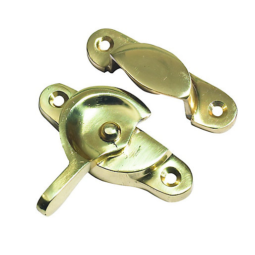 Electro brass sash window fitch fastener featuring a rounded design with a lever and two mounting holes for secure installation.