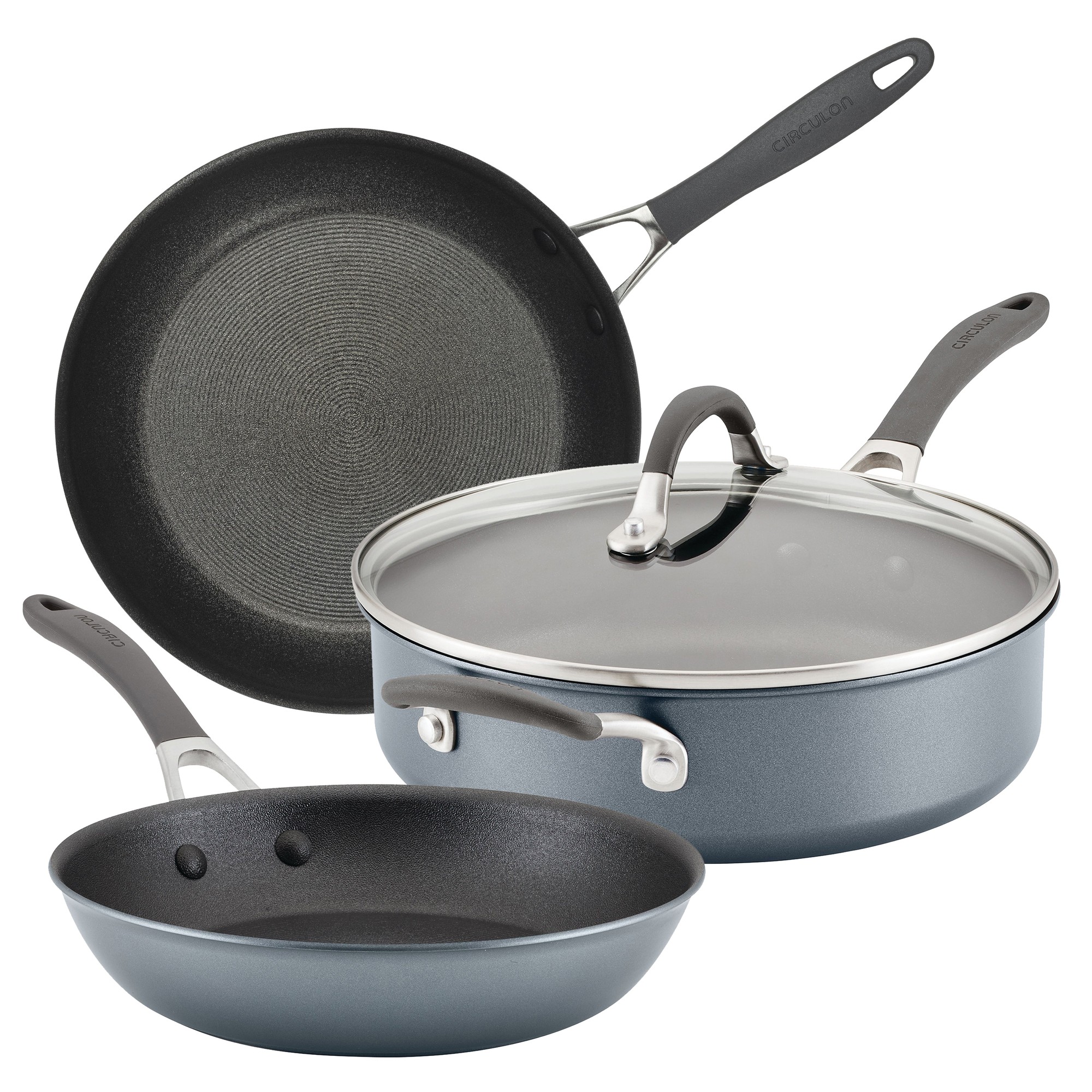 Three-piece cookware set featuring a grey non-stick frying pan, a sauté pan with a glass lid, and a smaller frying pan, all with durable handles and scratch-resistant surfaces.