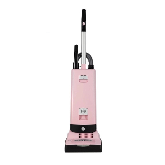 Pink upright vacuum cleaner with a sleek design, featuring a black base, a transparent dust container, and a silver handle on top for easy maneuverability.