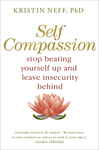 White book cover with gold and pink text, featuring a pink lotus flower at the bottom; the title "Self-Compassion" is prominently displayed above the author's name, Kristin Neff, PhD.