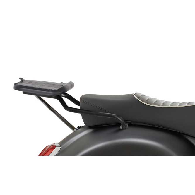 Black Top Master Topcase Fitting by Shad, featuring a sturdy metal frame and a flat mounting plate, designed for secure attachment to motorcycle rear seats.