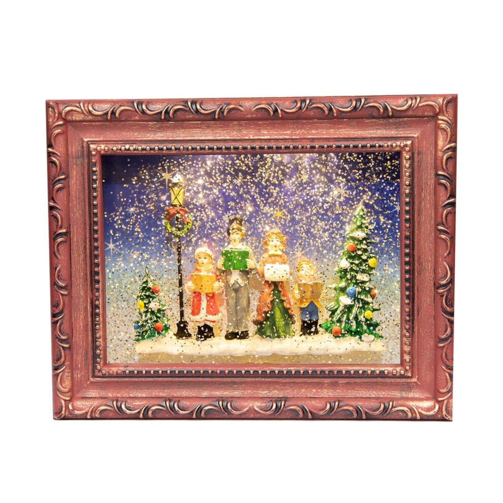 Glittery water spinner frame featuring a choir scene with four figures, a lamppost, and a decorated tree, all surrounded by swirling snowflakes in a festive setting.