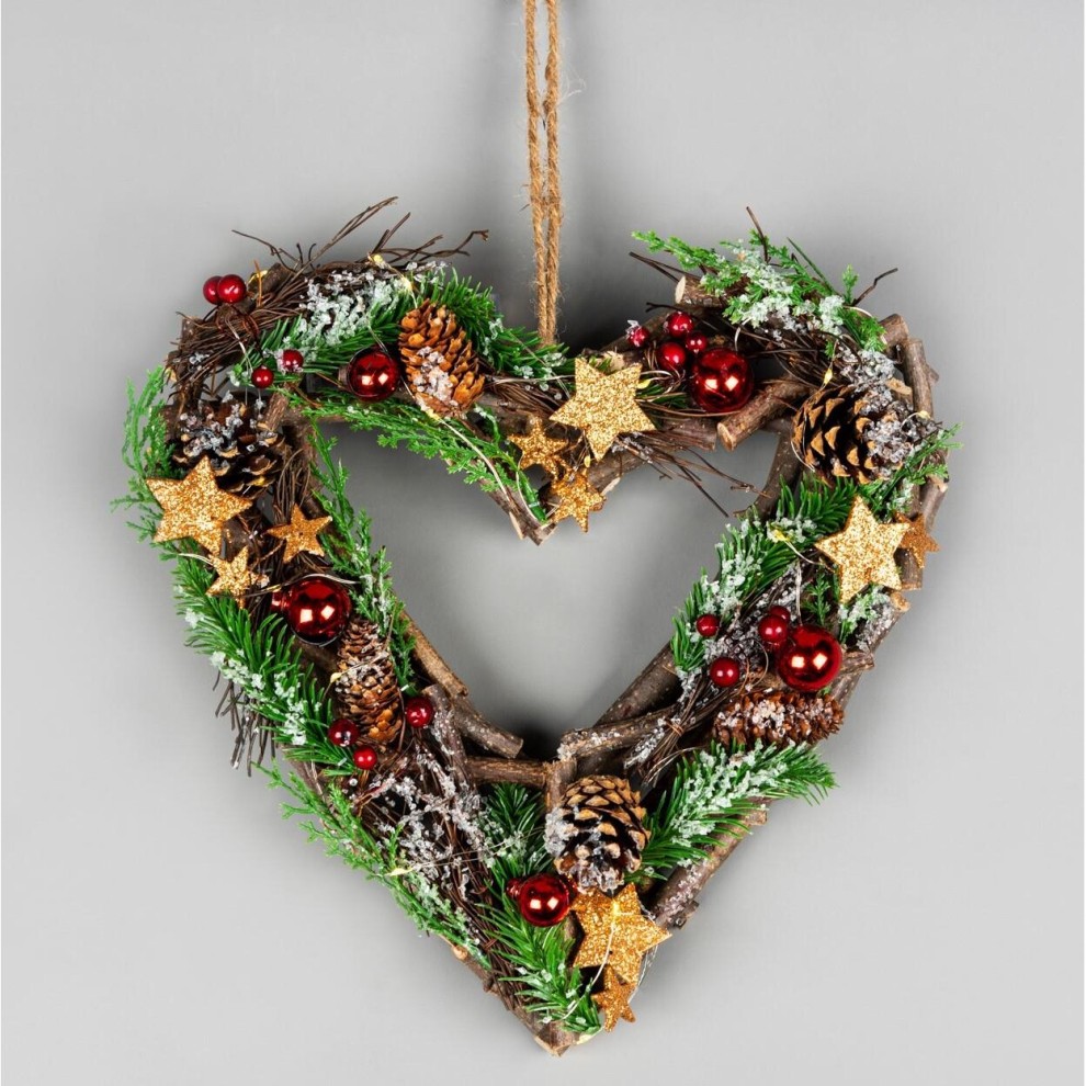 30cm heart-shaped wreath made of wooden twigs, adorned with pinecones, red berries, green foliage, and gold stars, featuring prelit battery-operated lights.