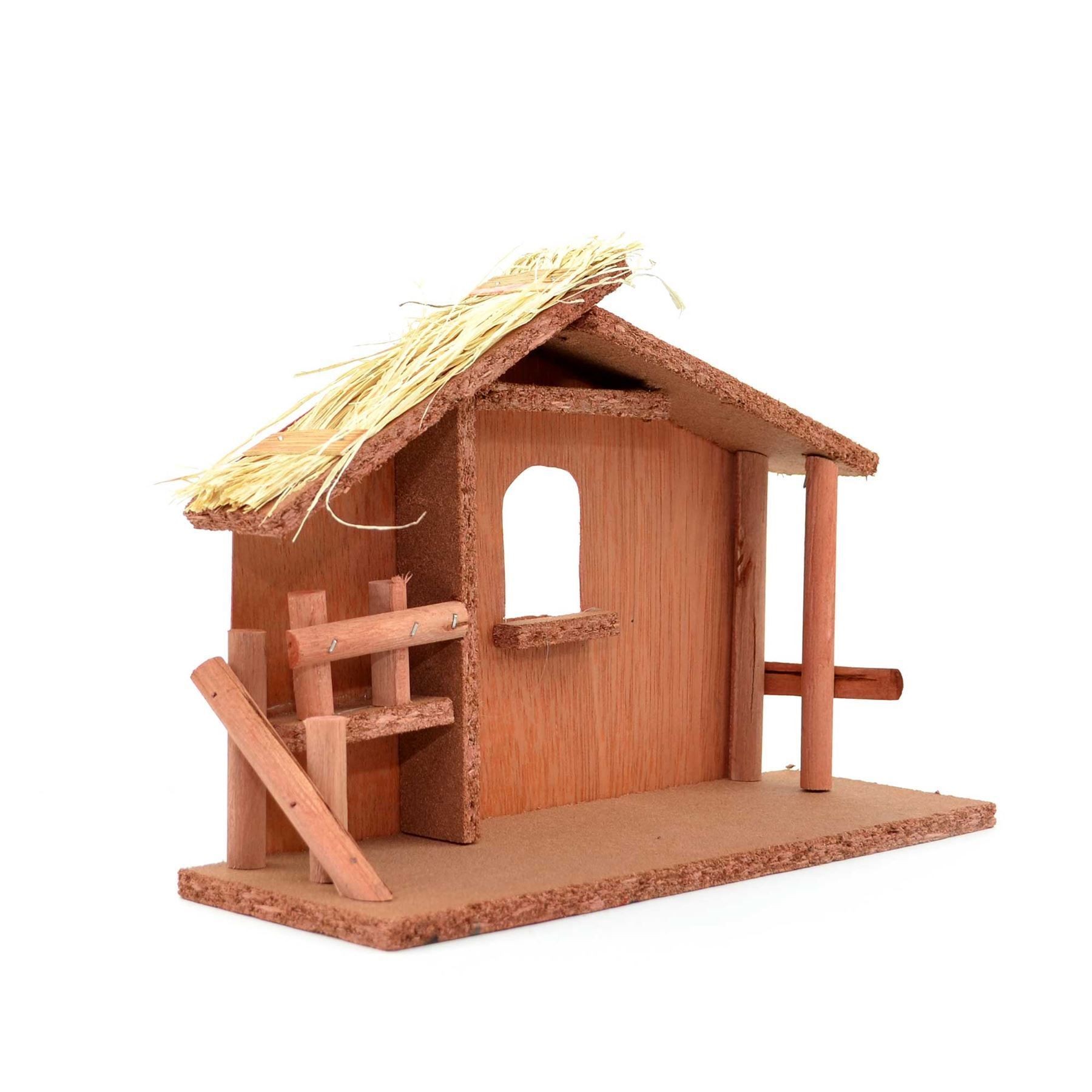 Large wooden nativity scene stable with a straw roof, featuring a rustic design, light brown color, and wooden support beams, ideal for Christmas decoration.