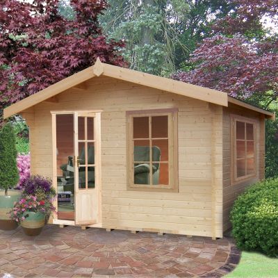 A wooden log cabin summerhouse in natural wood finish, measuring 3m x 3.6m, featuring large front windows, a double door, and a sloped roof, surrounded by greenery and decorative plants.