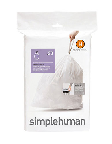 White packaging featuring a drawstring trash bag, labeled "Simplehuman Code H," containing 20 bags, suitable for 30-35 liter bins, with a hand holding the bag on the front.