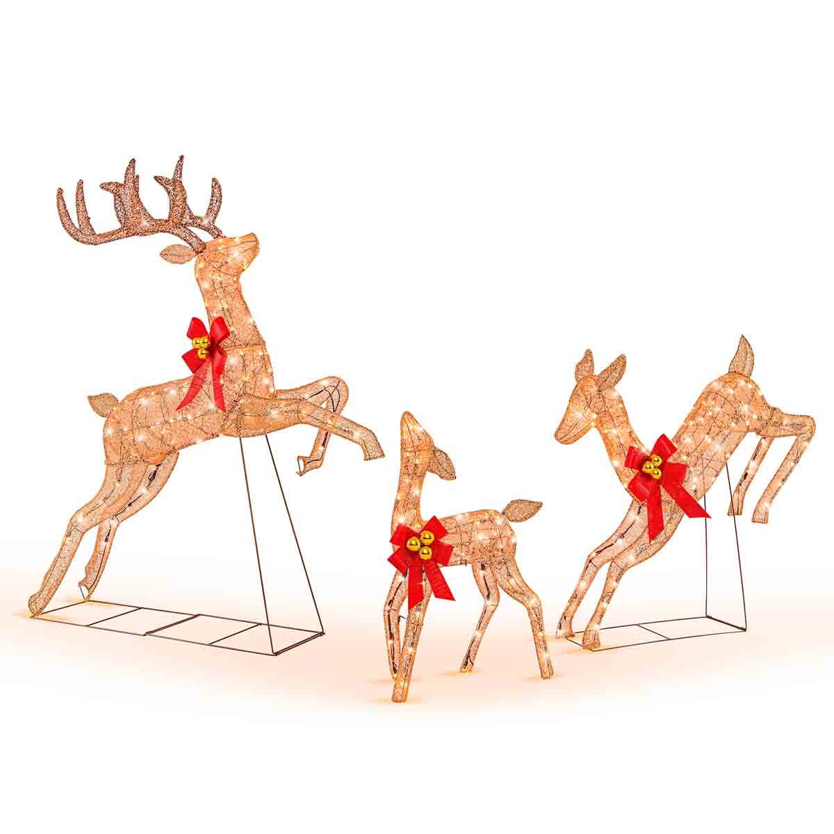 Three lighted Christmas reindeer in warm white lights, featuring a large reindeer with antlers and two smaller ones, all adorned with red bows, set against a white background.