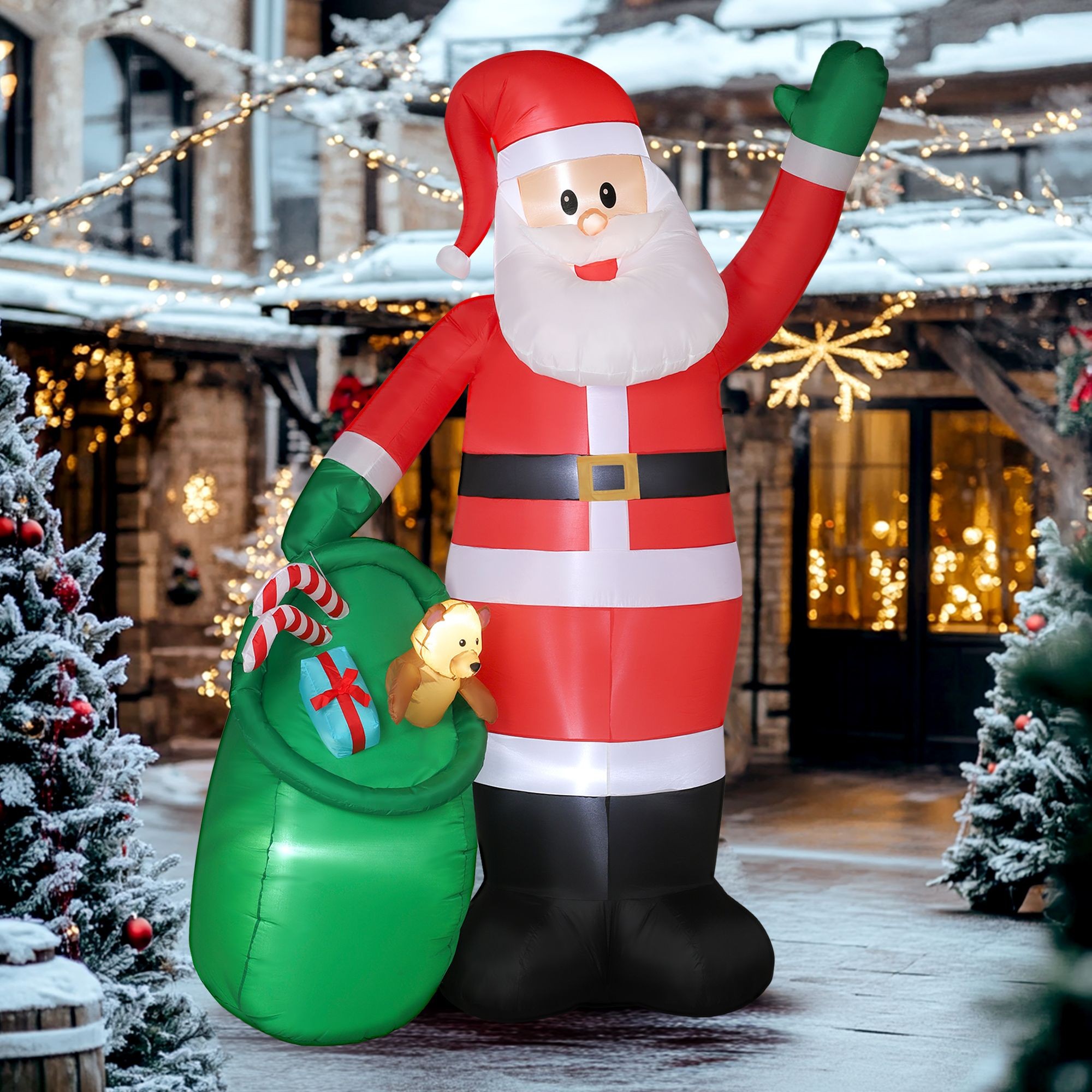 9ft inflatable Santa Claus with a cheerful expression, wearing a red suit with white trim, holding a green sack filled with gifts, and illuminated by built-in LED lights.