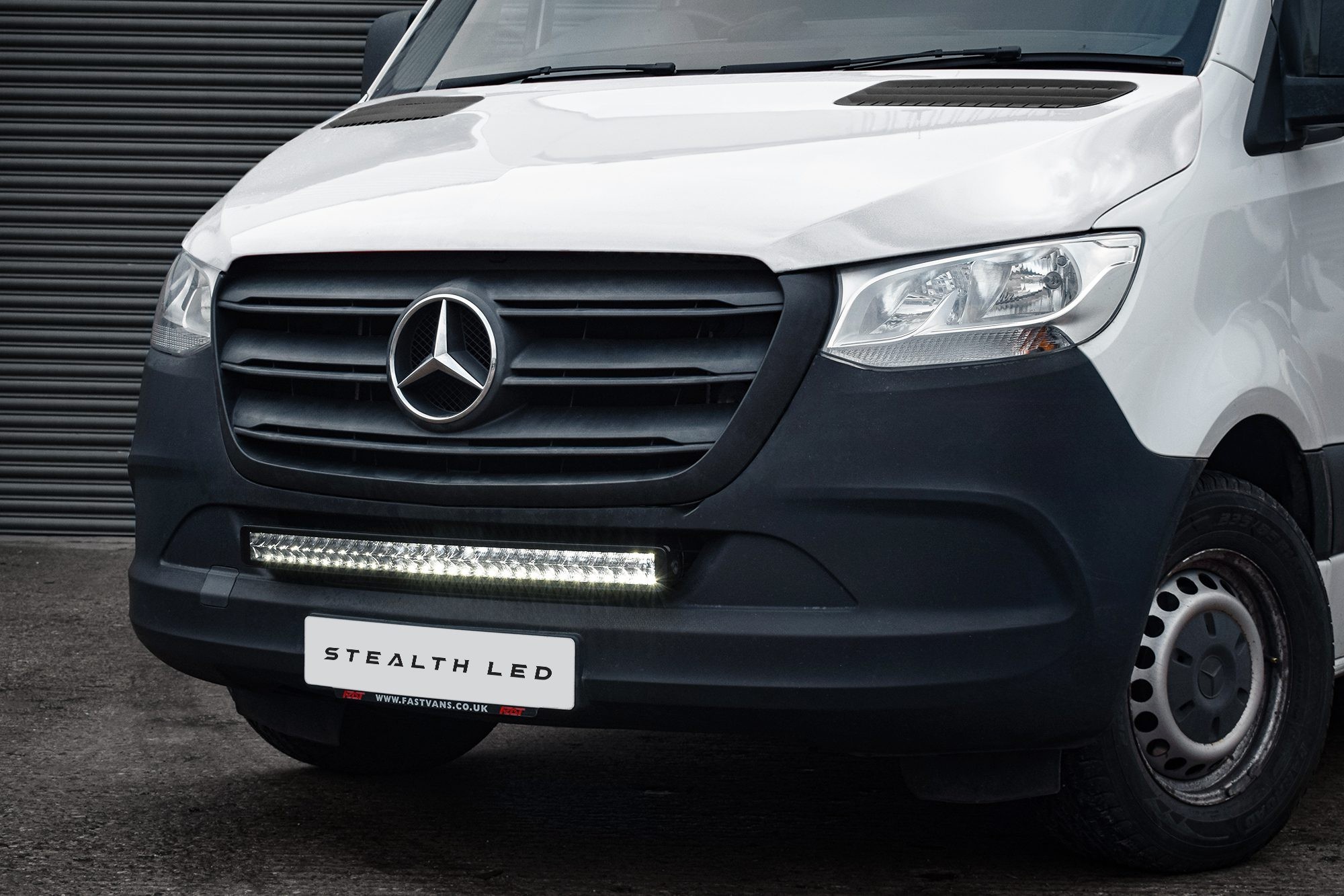Luminous LED integration grille kit for 2019+ Mercedes Sprinter, featuring a sleek black grille with a 30-inch LED light bar, delivering 25,200 lumens for enhanced visibility.