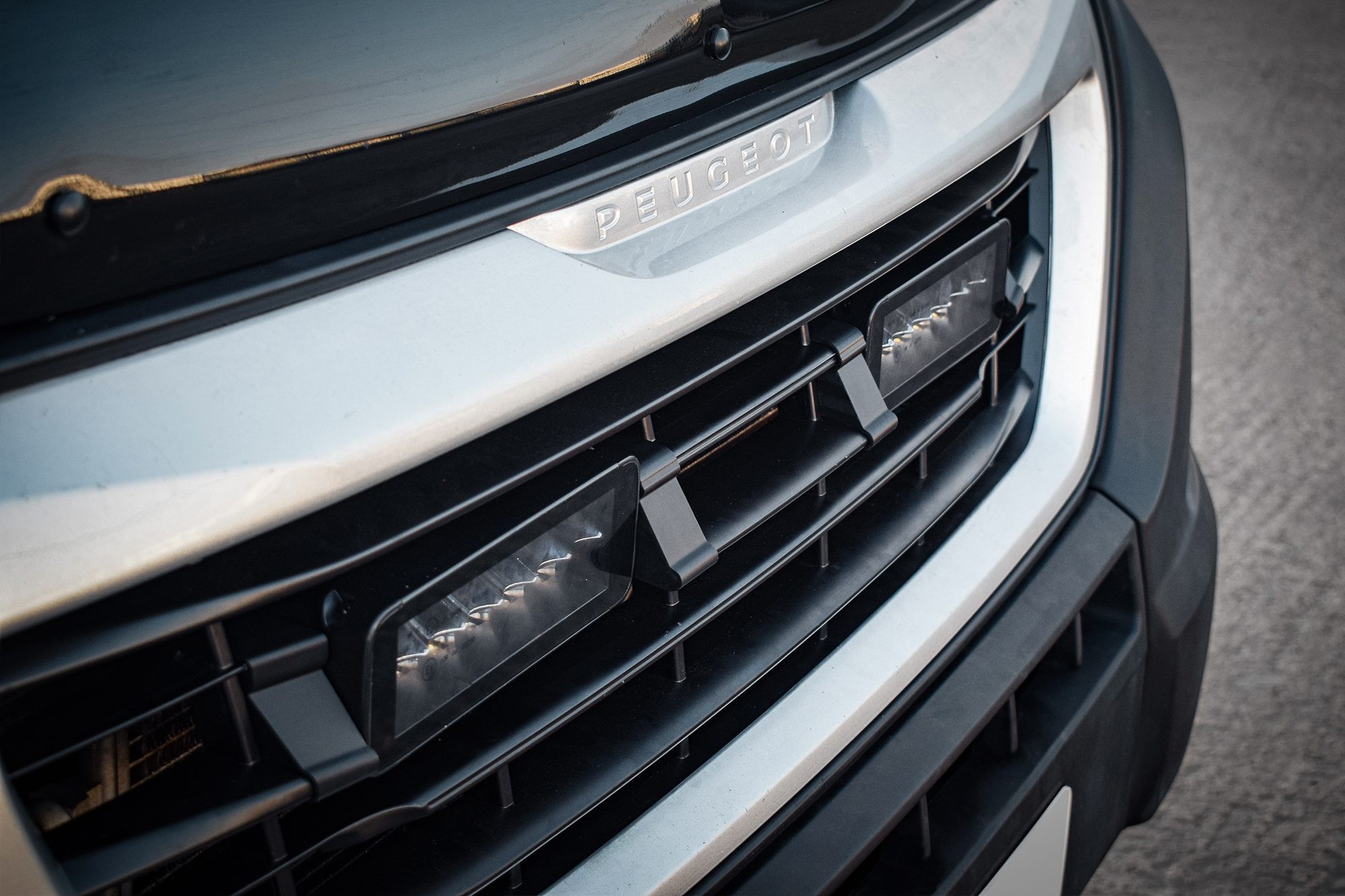Stealth LED integration kit for Peugeot Boxer 2014-2024 featuring twin 7" luminous LED lights, black housing, and a sleek design, providing 10,080 lumens of brightness.