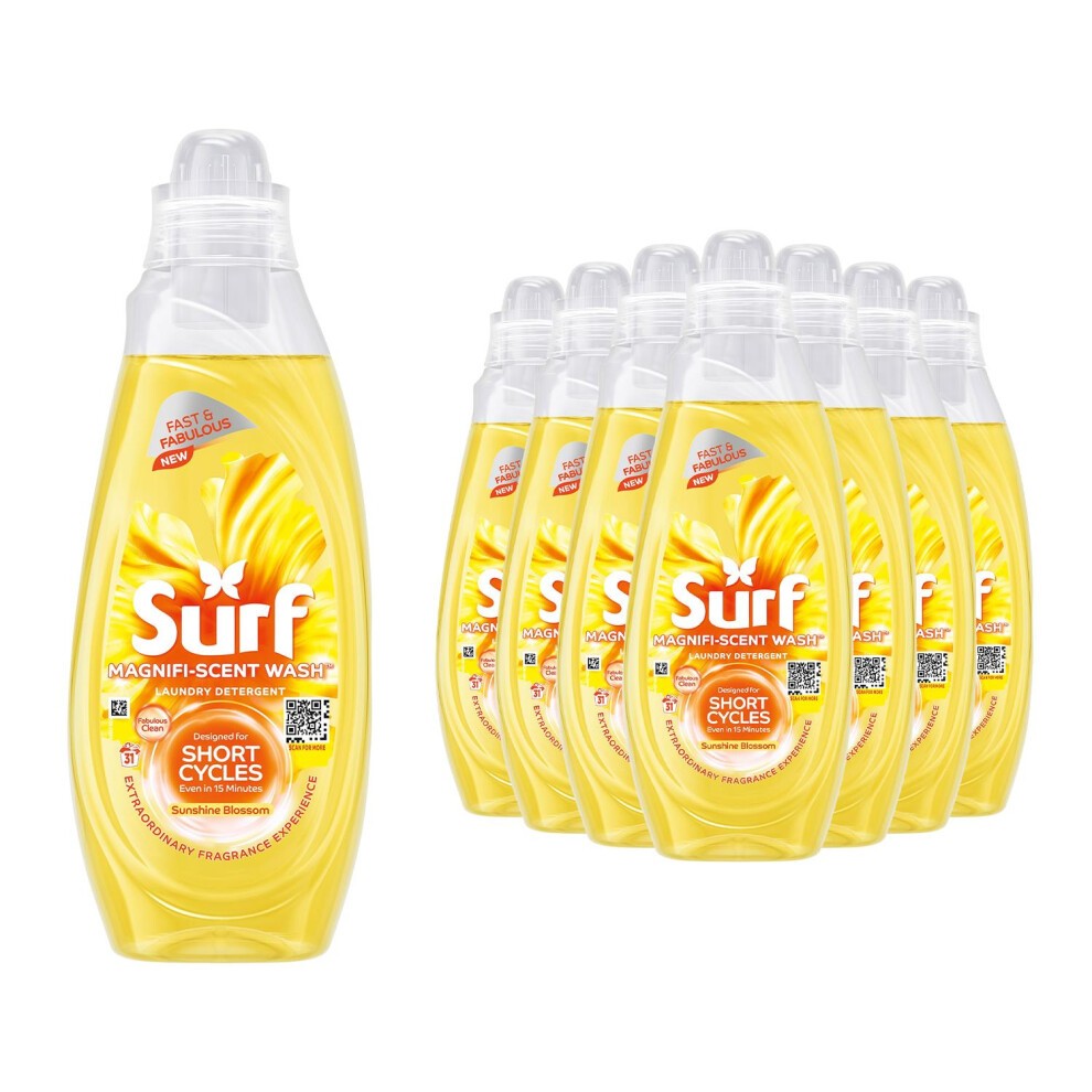 Eight bottles of Surf Magnifi-Scent Laundry Detergent in Sunshine Blossom scent, featuring a bright yellow design, a curved plastic bottle shape, and a clear label highlighting "Short Cycles."