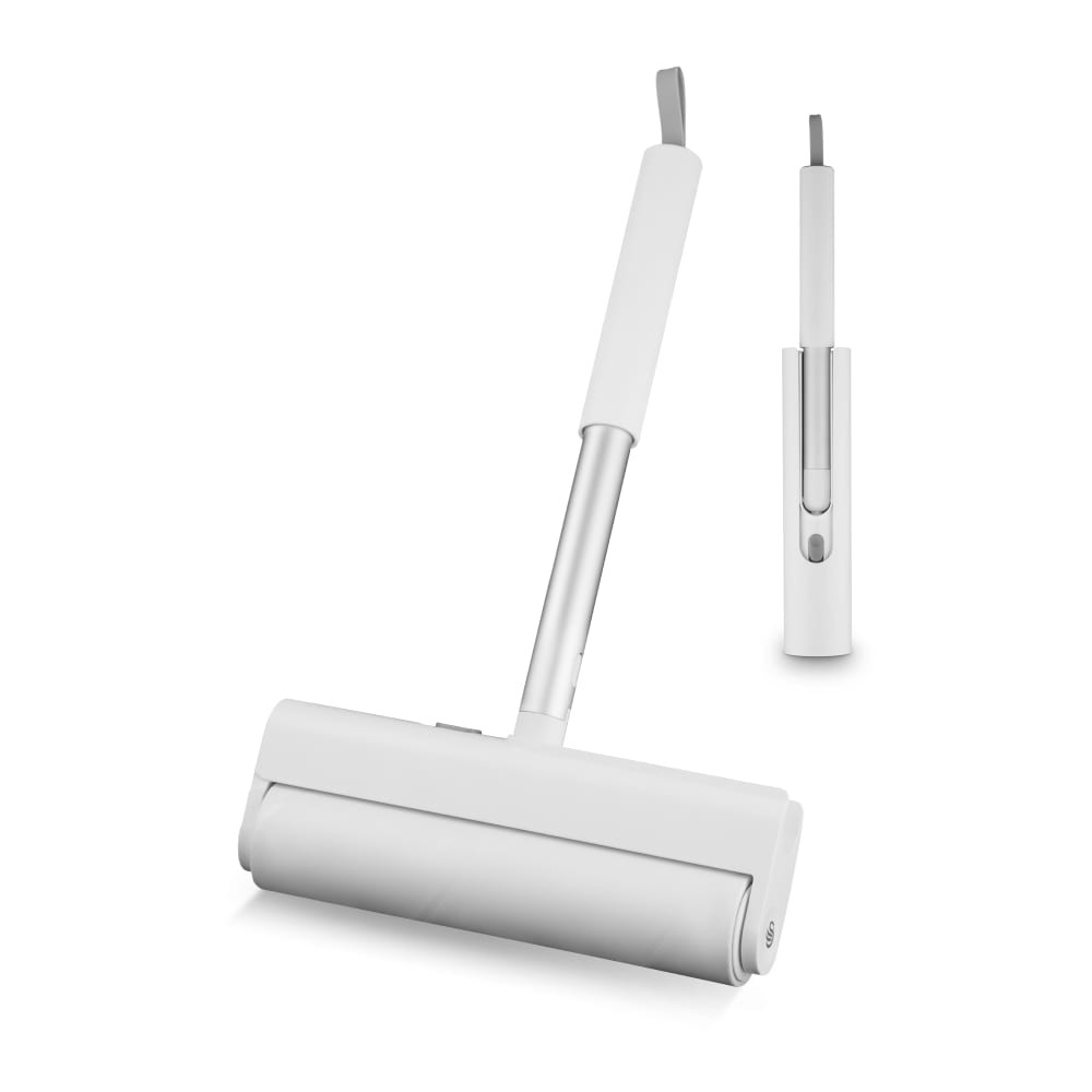 White handheld lint roller with an extra-wide adhesive roller and a sleek silver handle, featuring a retractable design for easy storage.