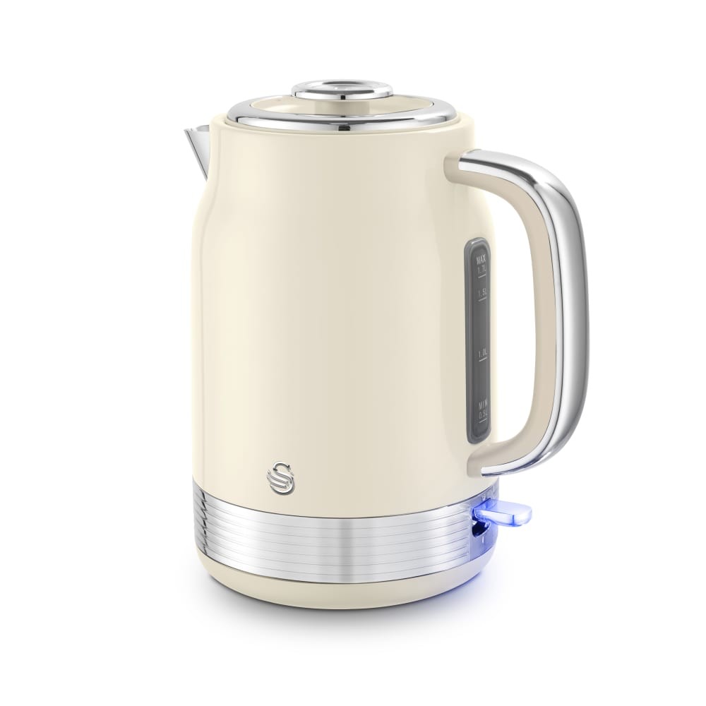 Cream-colored retro cordless jug kettle with a stainless steel base, clear water level indicator, and a blue illumination feature when in use.