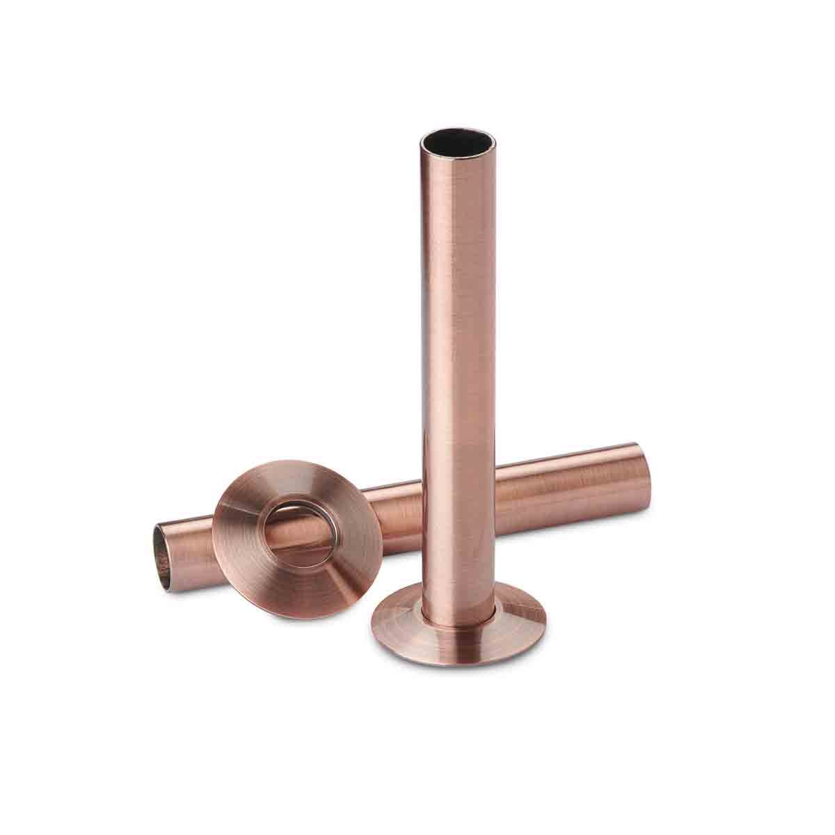 Antique copper pipe sleeving and metal collar set by Terma, featuring a smooth finish and a cylindrical design, ideal for a stylish plumbing solution.