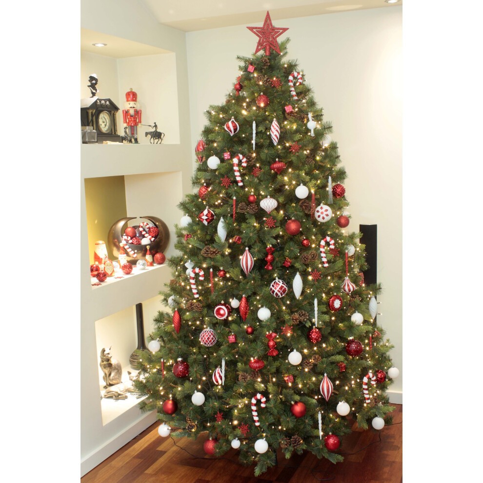 A decorated Christmas tree featuring a 128-piece blue and silver bauble set, showcasing various ornaments, including shiny baubles and candy cane designs, ideal for 6ft trees.