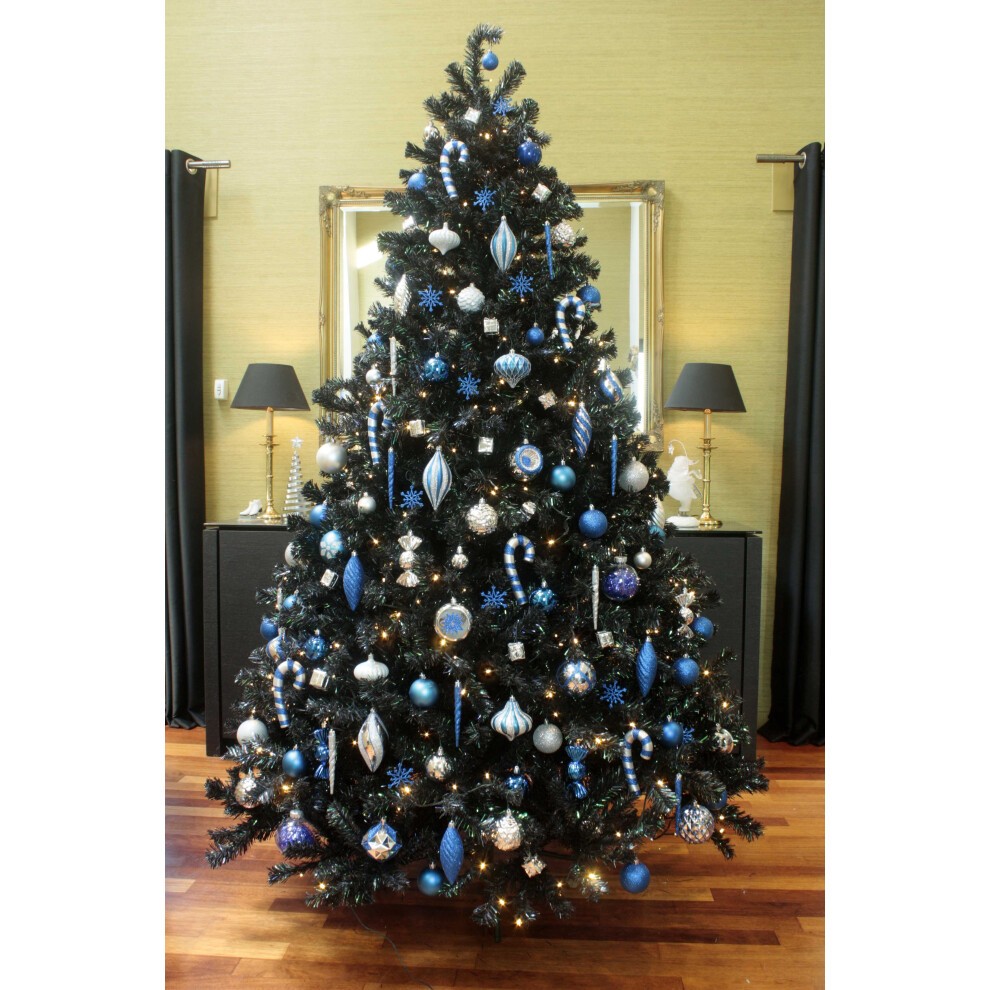 A beautifully decorated 7ft black Christmas tree adorned with a variety of blue and silver baubles, including shiny ornaments, snowflakes, and decorative shapes, set against a stylish backdrop.