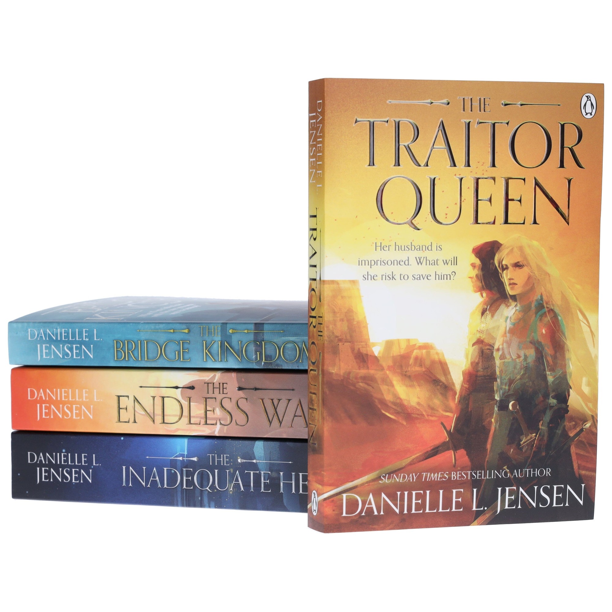 Four hardcover books in a fantasy romance series, featuring colorful covers with illustrations of characters and landscapes, with the title "The Traitor Queen" prominently displayed.