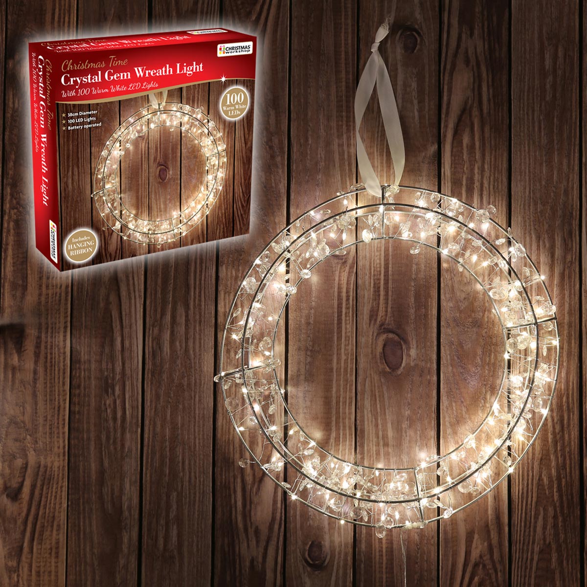 Crystal gem wreath light featuring 100 warm white LEDs, displayed against a wooden background, with a silver ribbon for hanging and a decorative box in the corner.