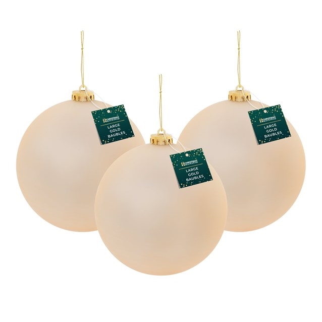 Three 15cm gold traditional matte baubles with a smooth finish, featuring gold caps and hanging loops, packaged with tags from The Christmas Workshop.
