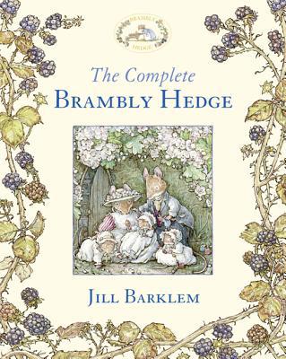 A softcover book featuring a whimsical illustration of animals in a garden setting, surrounded by blackberries, with the title "The Complete Brambly Hedge" in blue lettering.