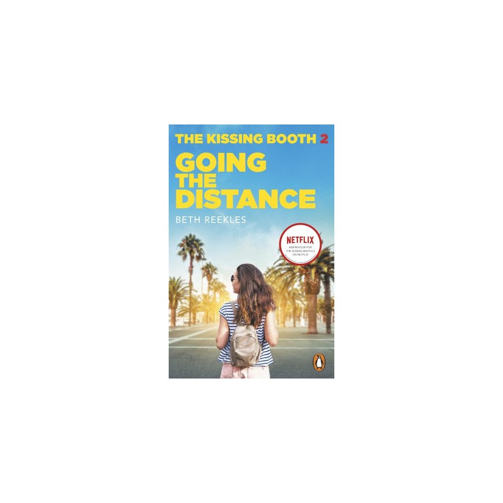 Book cover featuring a girl with a backpack, standing on a sunny street lined with palm trees, with a bright blue sky and the title "The Kissing Booth 2: Going the Distance" prominently displayed.