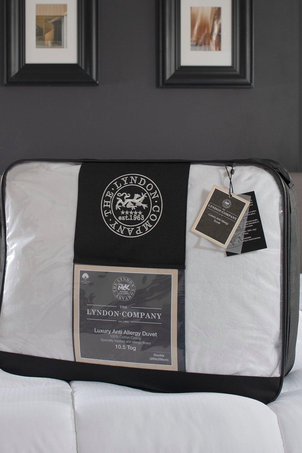 Luxury anti-allergy duvet by The Lyndon Company, 10.5 Tog, in white, packaged in a clear plastic cover with a black handle and branded label, suitable for double beds.
