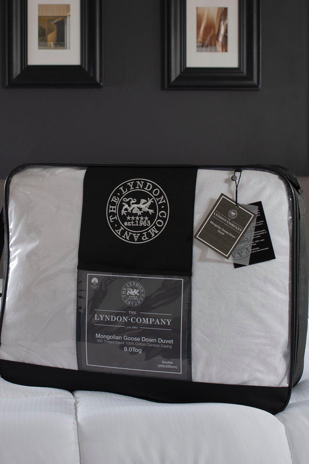 Luxury white Mongolian goose down duvet by The Lyndon Company, 9 tog, double size, packaged in a clear plastic cover with a black and silver logo and tags.