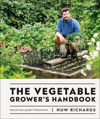 A man kneels in a lush garden, surrounded by green plants and vegetables, with the book title prominently displayed at the bottom in bold black letters.