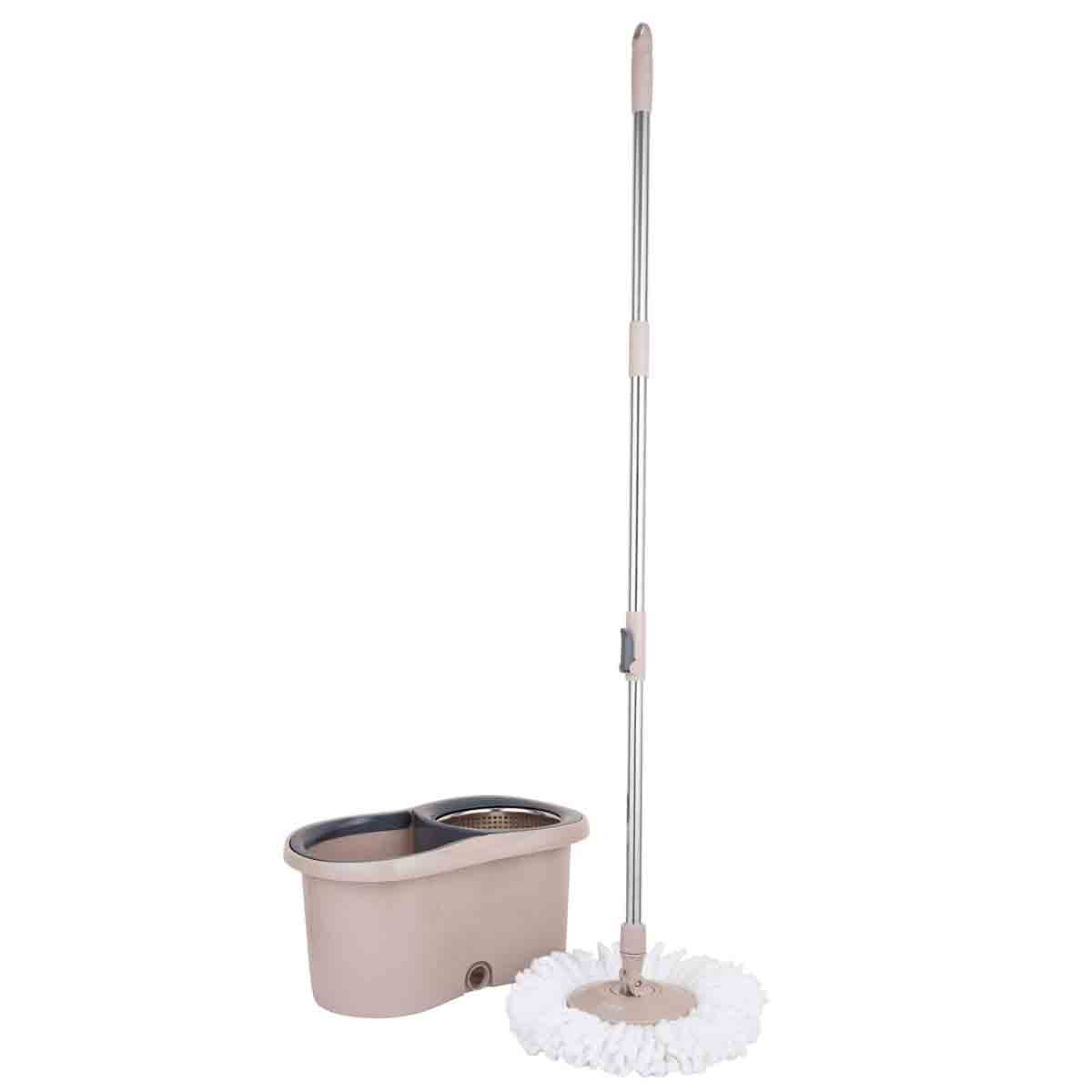 Tower Classic Spin Mop in latte color features a stainless steel handle, a fluffy white mop head, and a compact beige bucket with a built-in wringer.