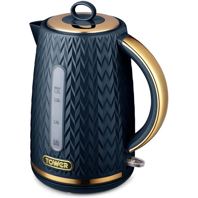 Midnight blue kettle with a textured body, brass accents on the lid and handle, a clear water level indicator, and a 1.7L capacity, designed by Tower.