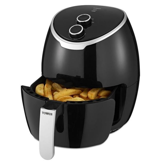 Black Tower T17061BLK Vortx 4L Manual Air Fryer with a glossy finish, featuring two adjustable dials on top and a pull-out basket filled with golden fries.