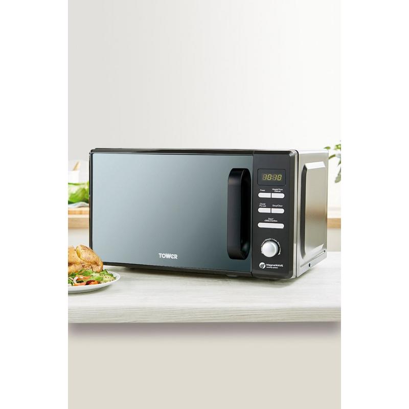 Tower 20 Litre 800W digital microwave in white with a sleek mirror door, featuring a control panel with buttons and a display for easy operation.