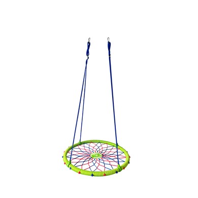 Colorful 38-inch round swing featuring a woven dreamcatcher design in vibrant green, blue, and red, suspended by sturdy blue ropes for outdoor play.