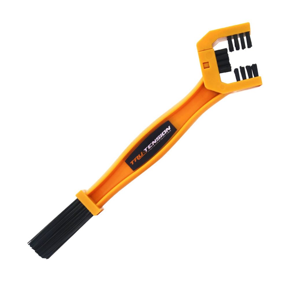 Tru-Tension Muck Monkey Chain Cleaning Brush in bright orange plastic with a dual-ended design featuring stiff bristles and a flat brush for effective cleaning.