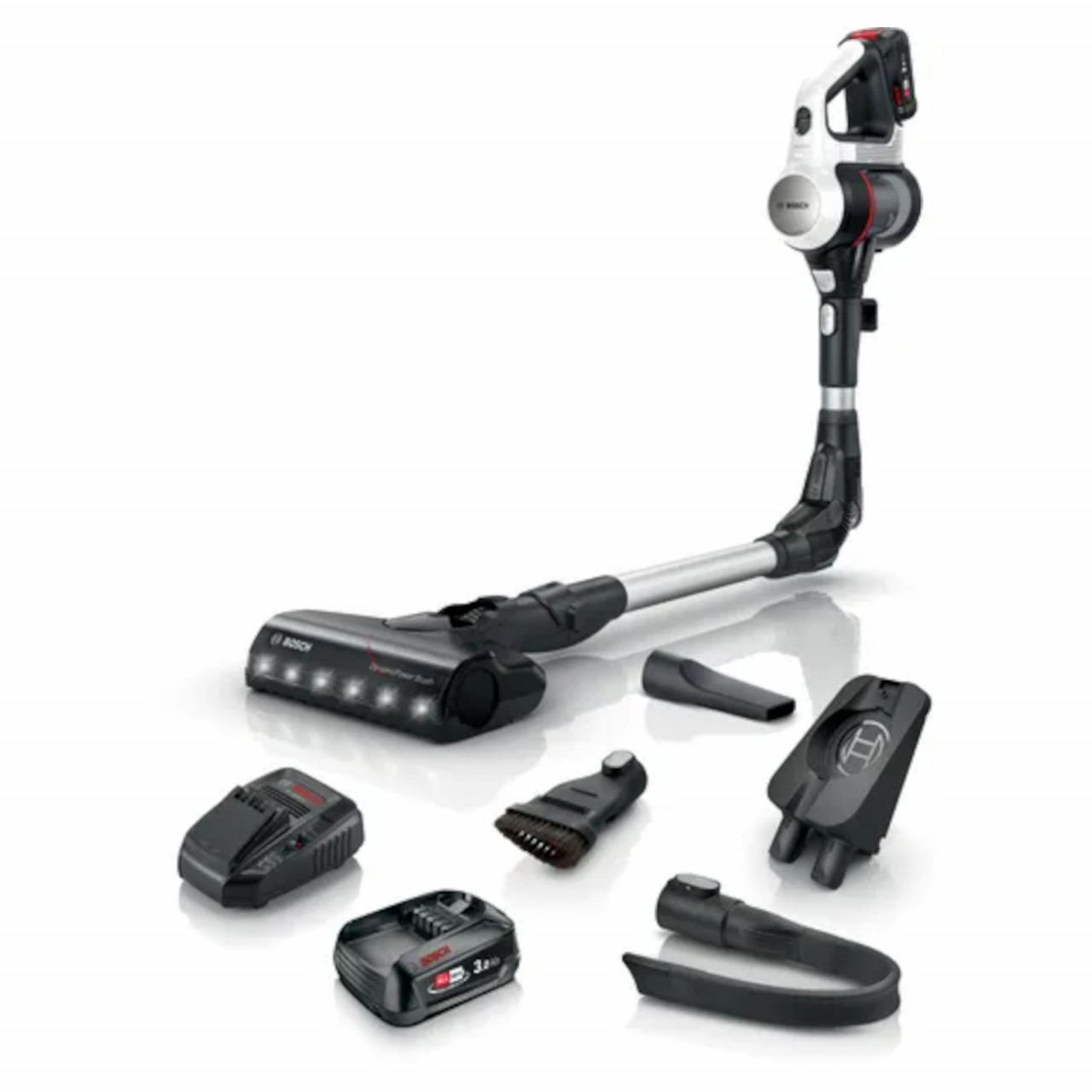 Bosch BCS712GB Unlimited 7 cordless vacuum cleaner in white with a sleek design, includes various attachments, a battery pack, and a motorized brush head.