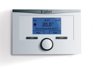 Vaillant 0020124498 New Time Switch 160 Digital Programmer features a white panel, a large blue LCD display showing temperature, and a central dial for easy adjustments.
